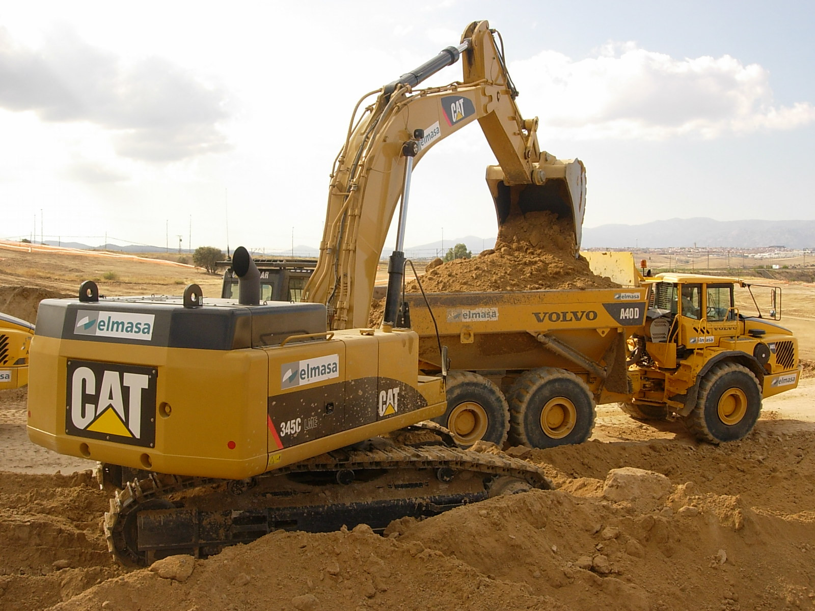 345C LME, Caterpillar, Maquinaria, Volvo A40D, Retroexcavadora, Dumper articulado, Excavator